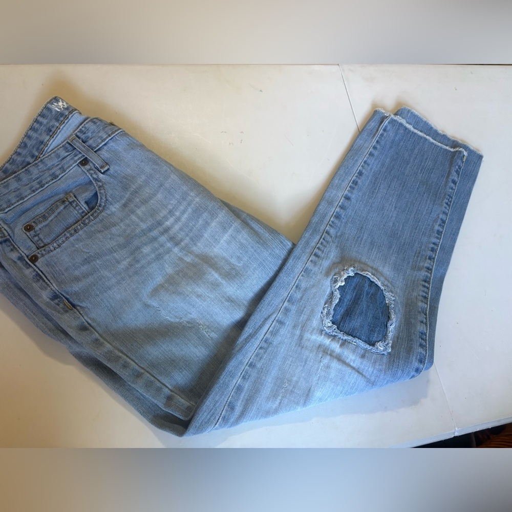 Light Blue Mossimo Distressed stretch Jeans
Size 8 R, w/ factory patched knees